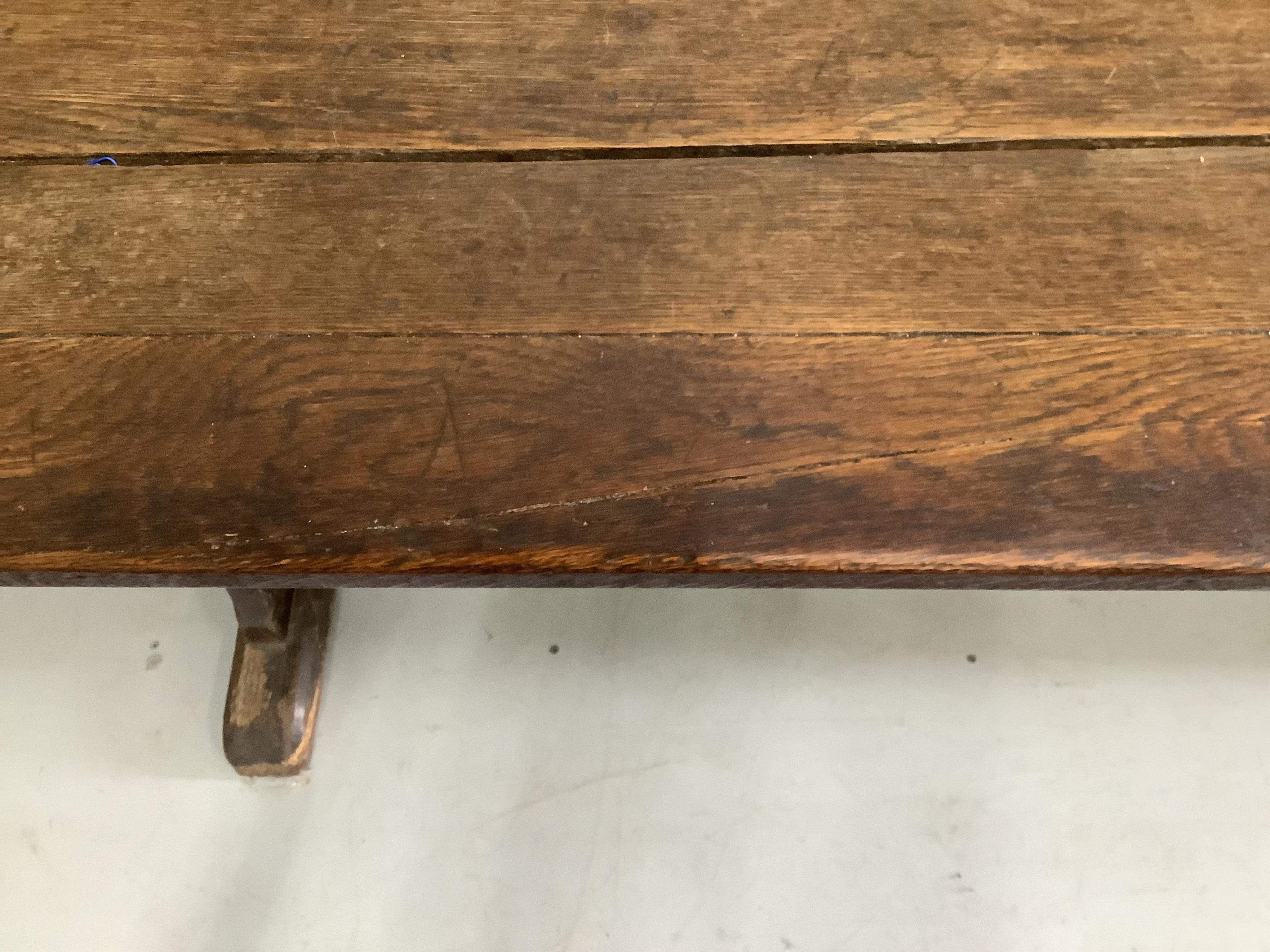 An 18th century and later rectangular oak tavern table, width 205cm, depth 69cm, height 76cm. Condition - fair